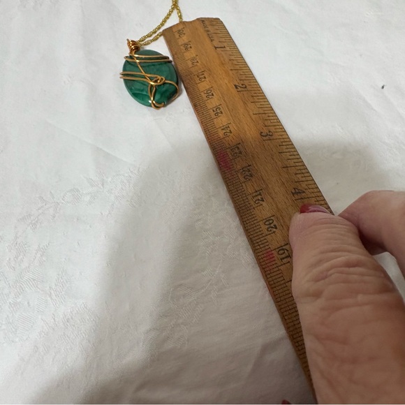 malachite wire-wrapped pendant with a gold-toned chain. - Picture 6 of 6